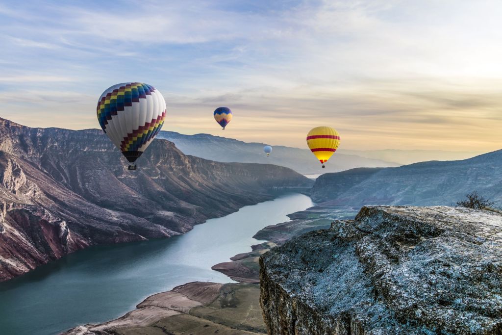 hot air balloons with canyon view